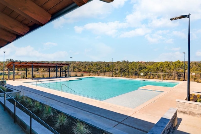 view of pool with a pergola