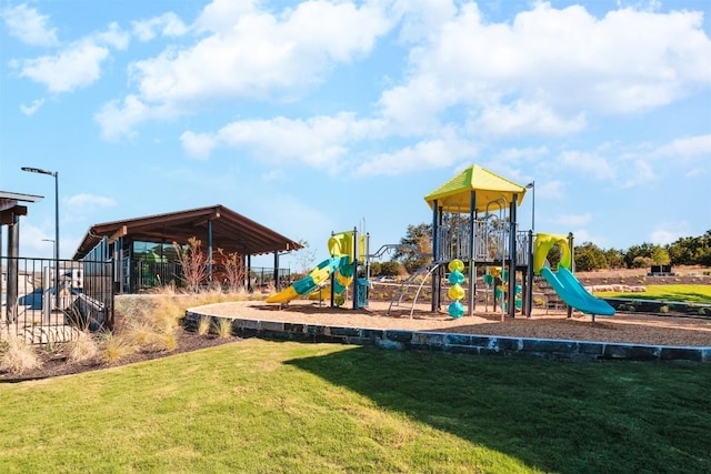 view of jungle gym with a yard