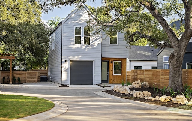 view of front of property with a garage