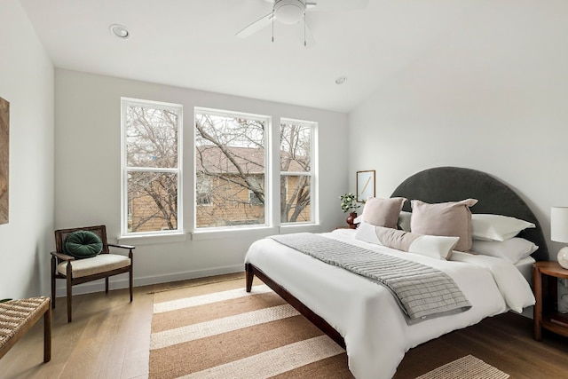 5107 Menchaca Rd Unit 4, Austin, TX 78745 - bedroom featuring wood finished floors, vaulted ceiling, recessed lighting, and a ceiling fan