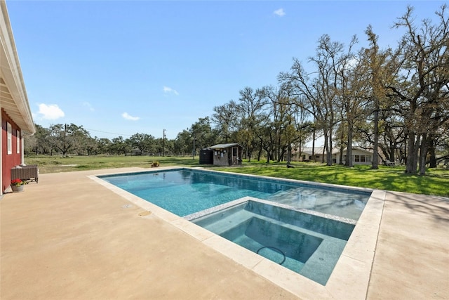 view of pool with an in ground hot tub, a shed, a patio area, and a lawn