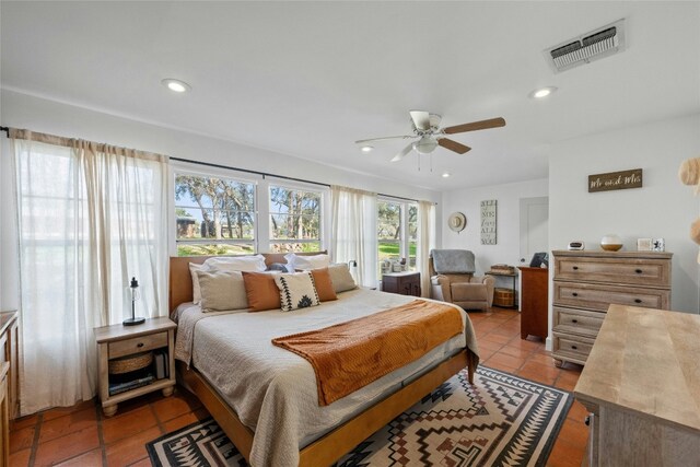 bedroom featuring ceiling fan and light tile patterned floors