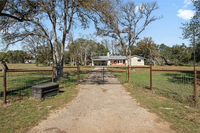 exterior space with a rural view