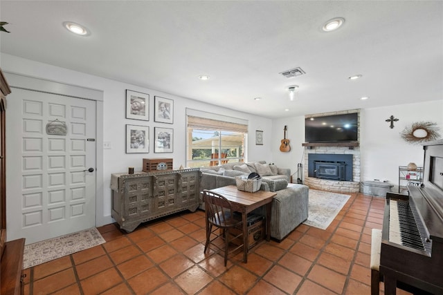 living room featuring dark tile patterned flooring