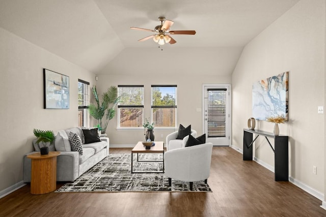 living room featuring ceiling fan, dark hardwood / wood-style flooring, a healthy amount of sunlight, and lofted ceiling