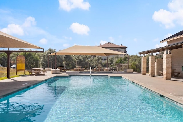 view of swimming pool featuring a patio