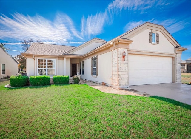 ranch-style home with a front yard and a garage