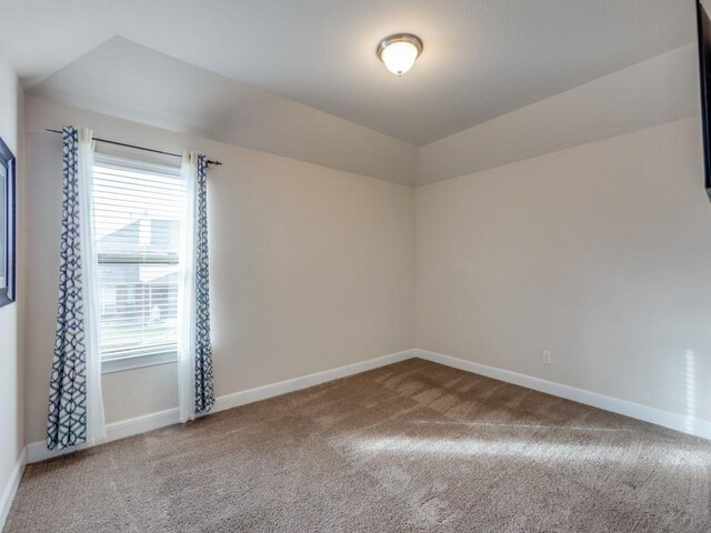 unfurnished room featuring carpet floors