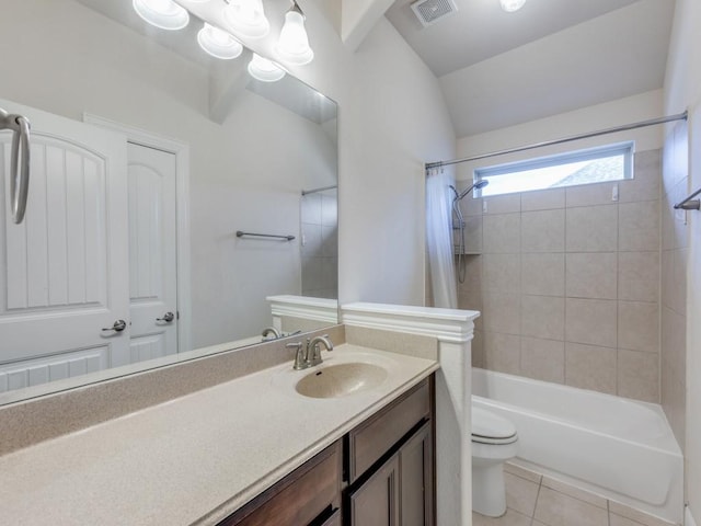 full bathroom featuring tile patterned floors, lofted ceiling, toilet, shower / tub combo with curtain, and vanity