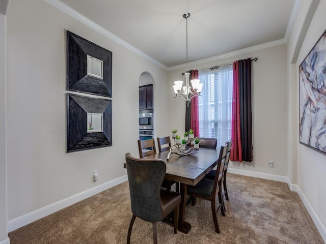 carpeted dining space with a notable chandelier and crown molding