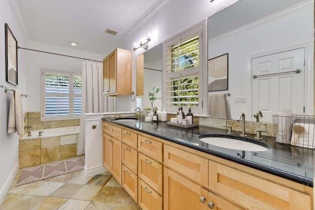 bathroom featuring a healthy amount of sunlight, ornamental molding, vanity, and tiled tub