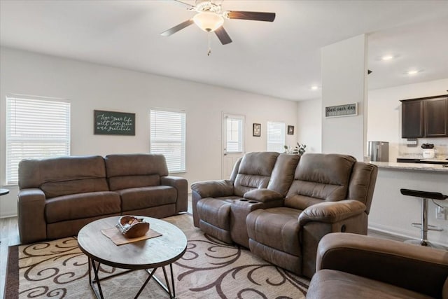 living room featuring ceiling fan