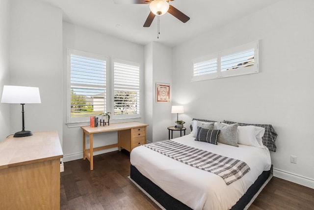 bedroom featuring dark hardwood / wood-style flooring and ceiling fan