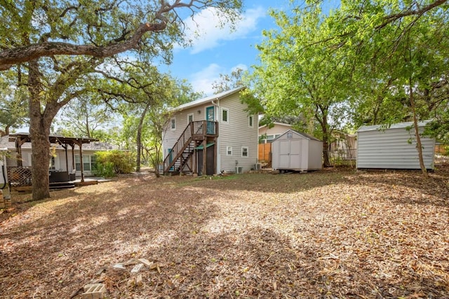 back of property featuring a storage unit