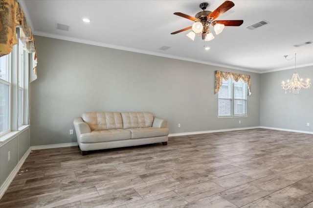 interior space featuring visible vents, crown molding, and baseboards