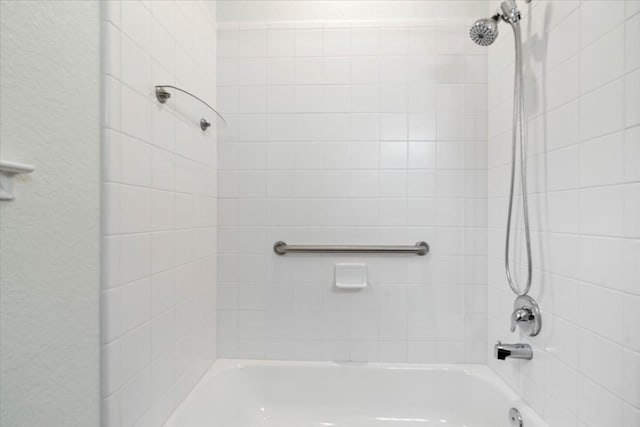 bathroom with shower / tub combination