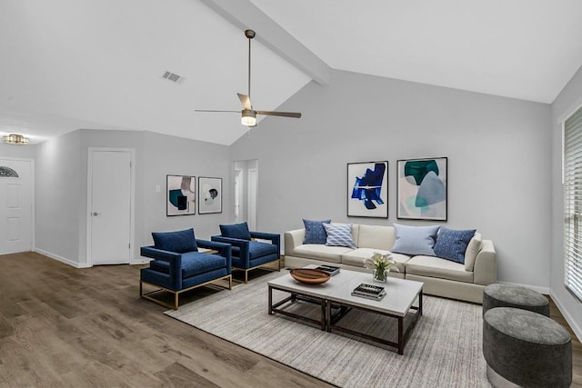 living room featuring beamed ceiling, hardwood / wood-style flooring, high vaulted ceiling, and ceiling fan