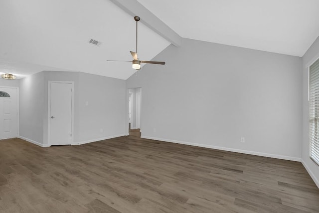 unfurnished living room featuring lofted ceiling with beams, dark hardwood / wood-style floors, and ceiling fan