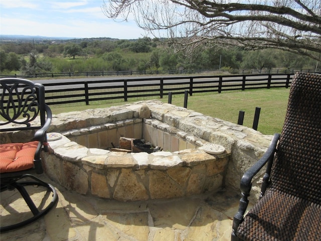 view of patio / terrace featuring a rural view