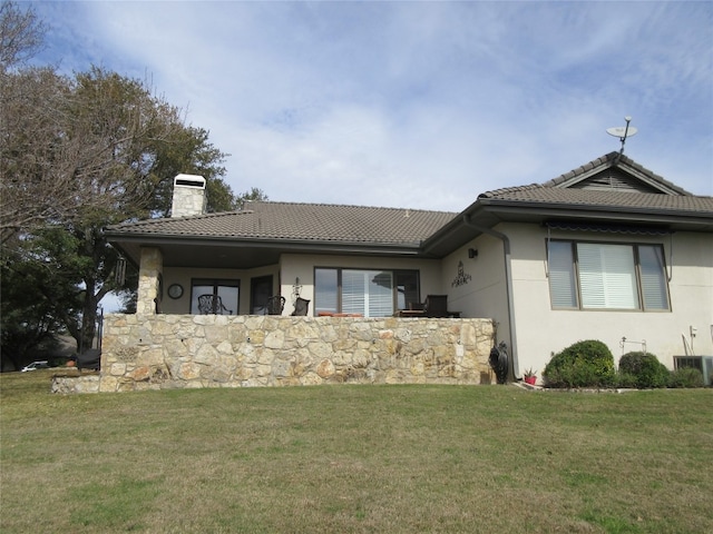 exterior space with a front yard