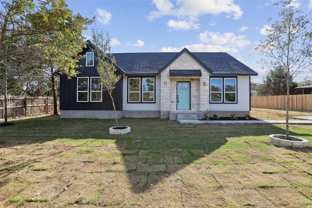 view of front of home with a front yard