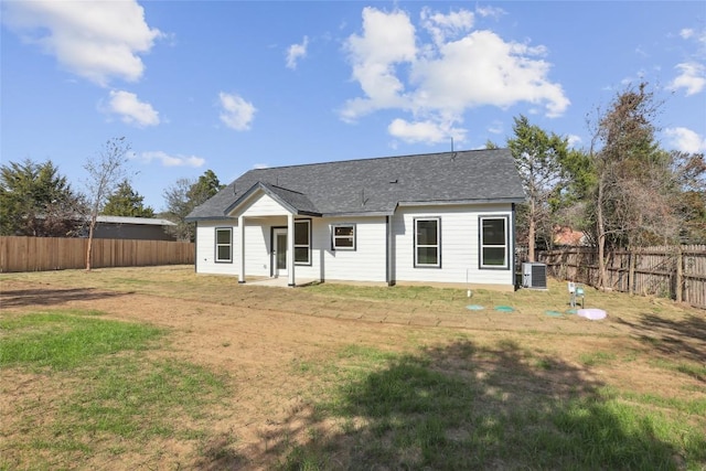 109 Creekside Dr, Bastrop, TX 78602 - rear view of house with central air condition unit