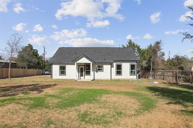 109 Creekside Dr, Bastrop, TX 78602 - view of front of house featuring cooling unit and roof with shingles