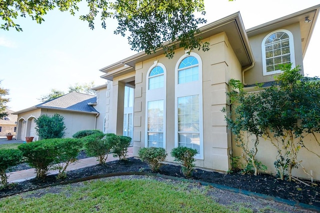 view of property exterior with a garage