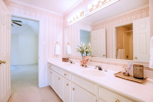 bathroom with vanity, ceiling fan, and crown molding