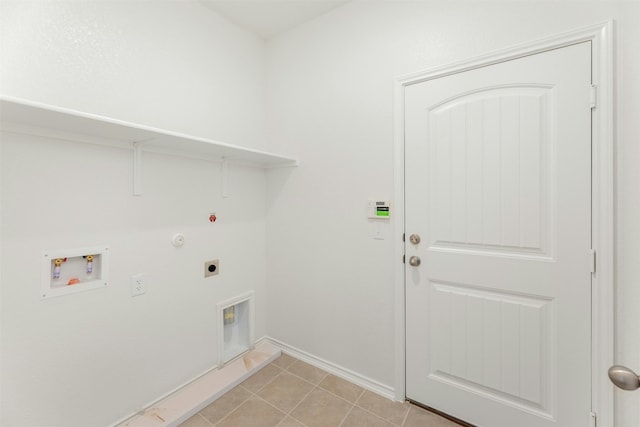 washroom with washer hookup, gas dryer hookup, electric dryer hookup, and light tile patterned flooring