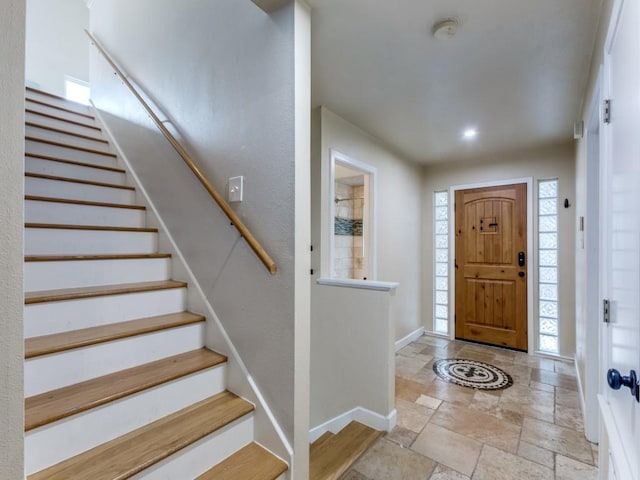 foyer entrance featuring plenty of natural light