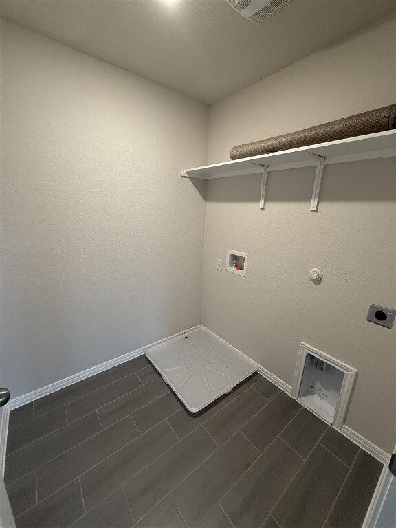 laundry room featuring electric dryer hookup, gas dryer hookup, and washer hookup