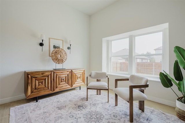 sitting room with light wood-type flooring