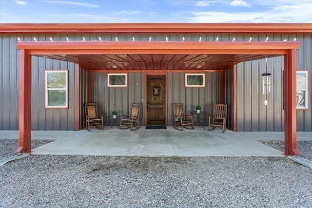 exterior space with a carport