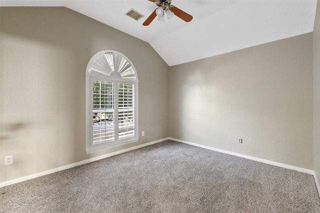 unfurnished room featuring carpet, ceiling fan, and lofted ceiling