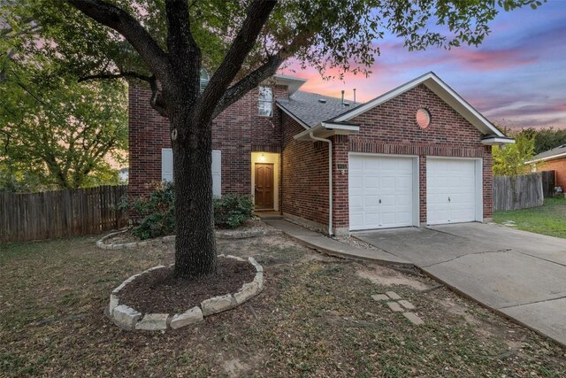 front of property featuring a garage