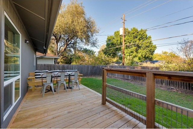 deck featuring a yard