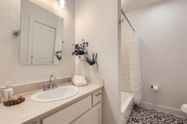 full bathroom featuring toilet, shower / bath combo with shower curtain, vanity, and tile patterned flooring