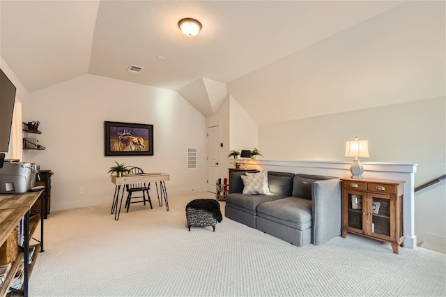 living room featuring light carpet and vaulted ceiling