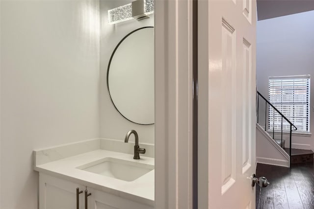 bathroom featuring wood-type flooring and vanity