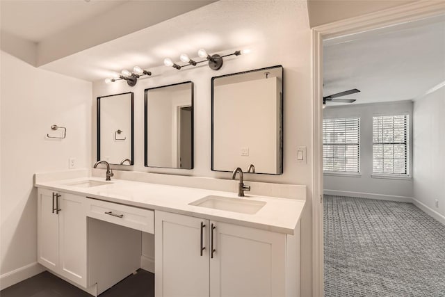 bathroom featuring vanity and ceiling fan