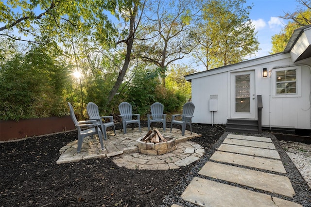 view of patio featuring a fire pit