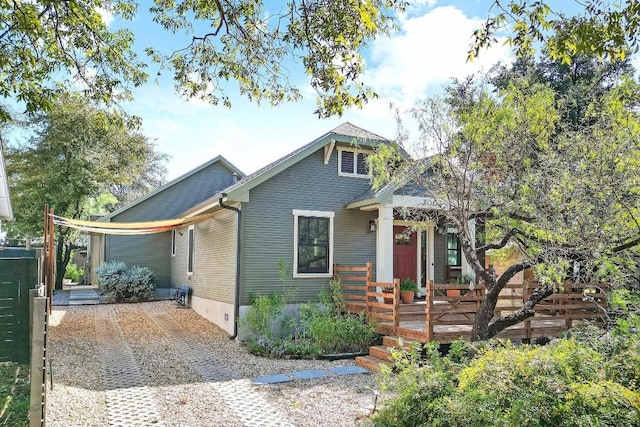 bungalow-style home featuring a deck