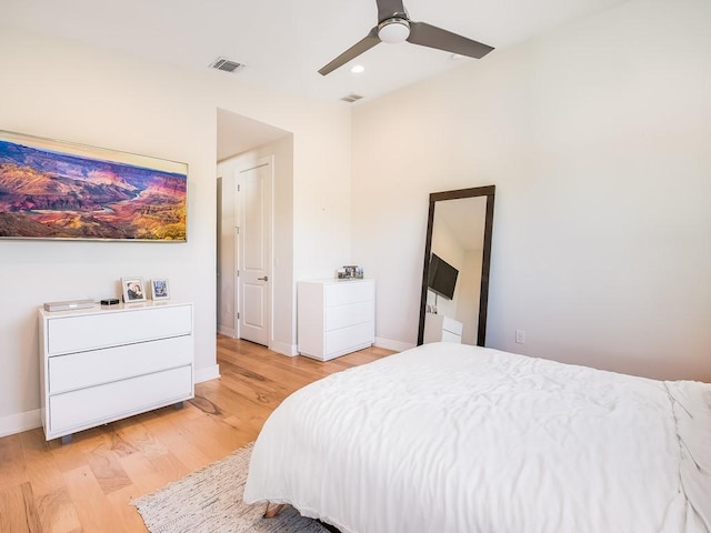 bedroom featuring ceiling fan and light wood-type flooring