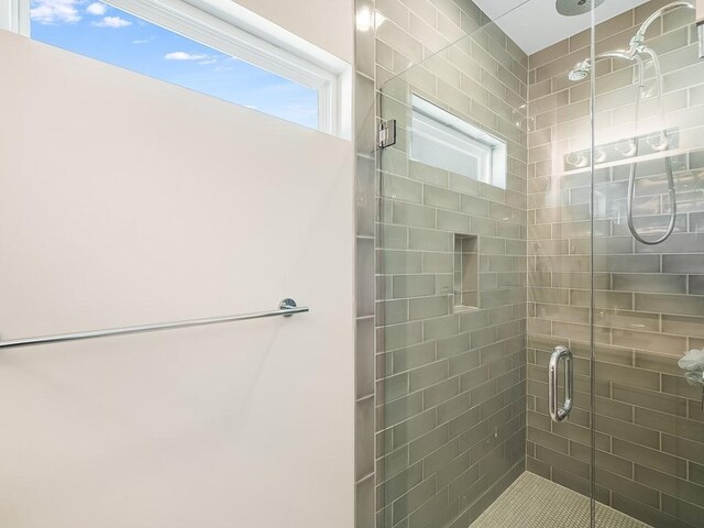 bathroom featuring walk in shower