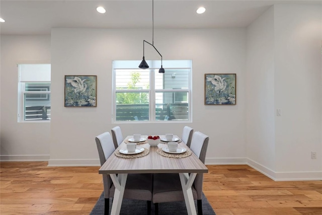 1211 Cometa St Unit B, Austin, TX 78721 - dining room featuring baseboards, light wood-type flooring, and recessed lighting