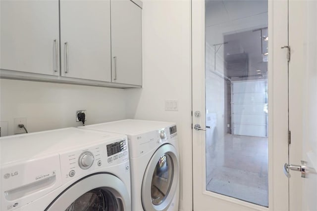 1211 Cometa St Unit B, Austin, TX 78721 - laundry area with washing machine and dryer and cabinet space