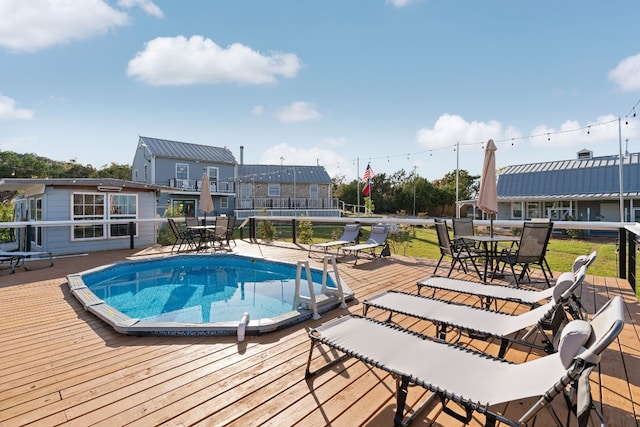 view of pool featuring a deck