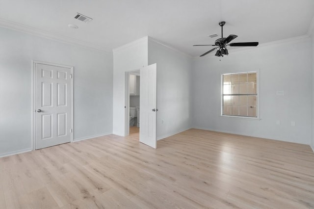 spare room with light wood-type flooring, ceiling fan, and crown molding