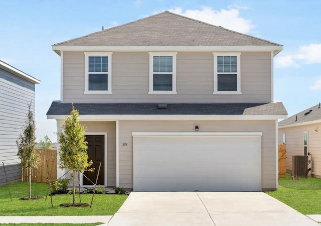 front of property with a garage and a front yard